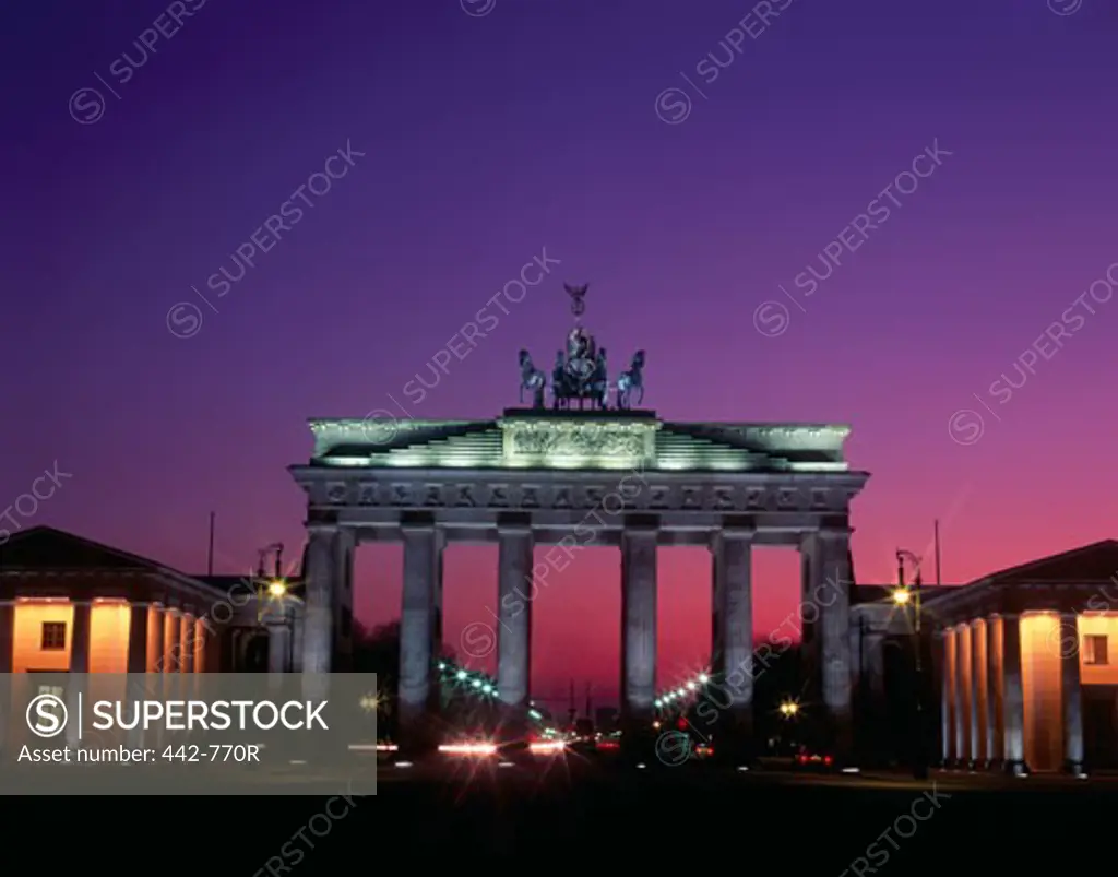 Low angle view of a gate lit up at dusk, Brandenburg Gate, Berlin, Germany