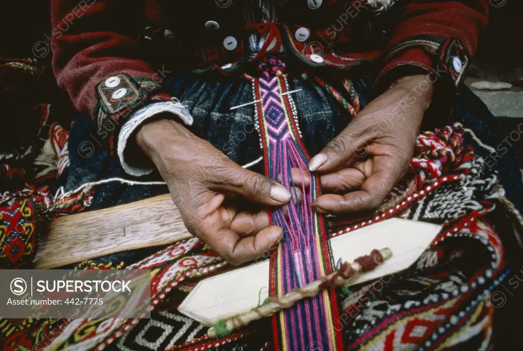 Close-up of a woman's hands weaving, Cuzco, Peru