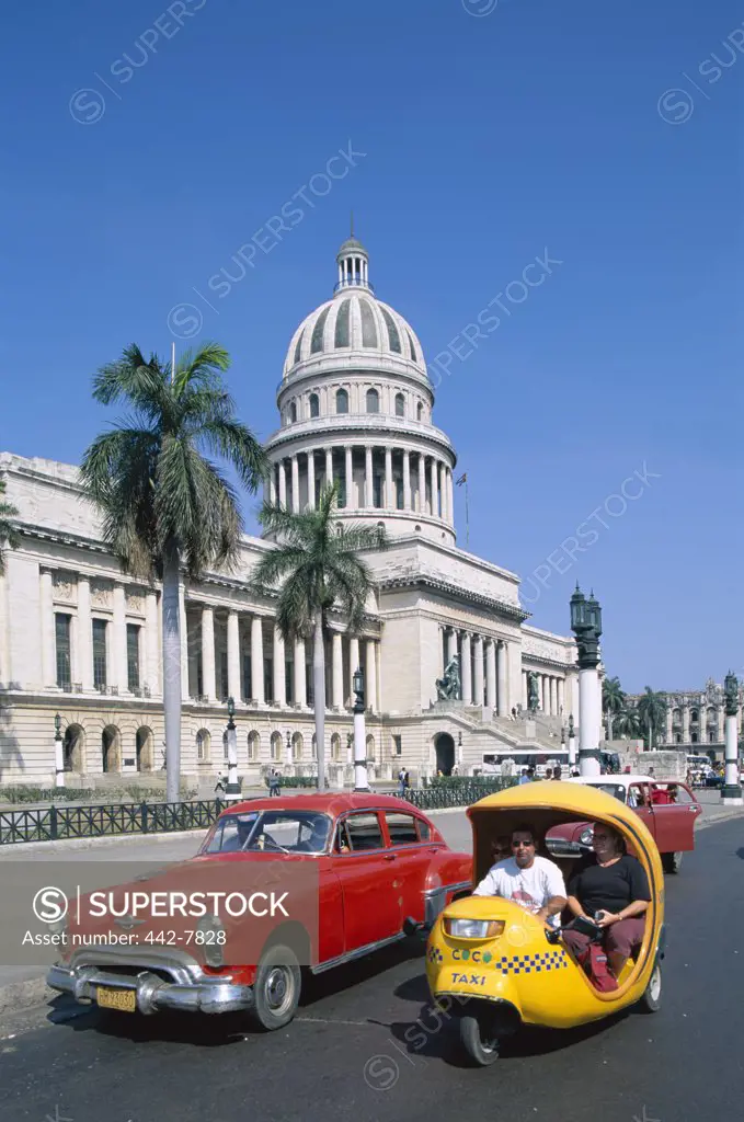 Vintage cars parked in front of a government building, Capitol Building, Havana, Cuba