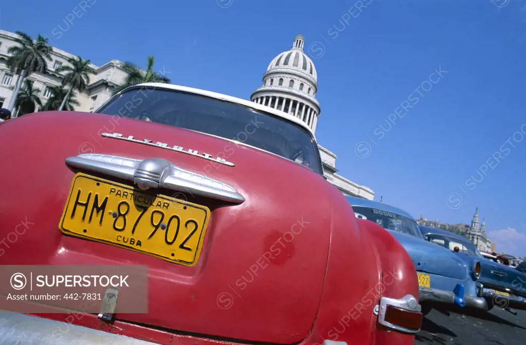 Close-up of vintage cars parked in front of a government building, Capitol Building, Havana, Cuba