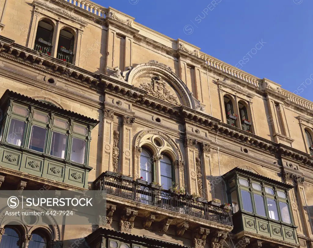 Low angle view of balconies on a building, Valletta, Malta