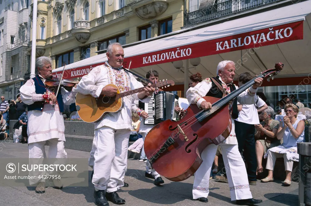 Street musicians playing musical instruments, Bana Josipa Jelacica Square, Zagreb, Croatia