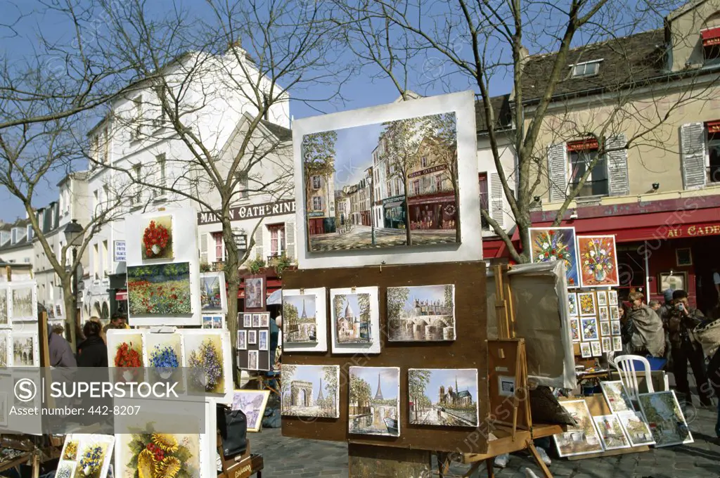 Painter with his paintings, Place du Tertre, Montmartre, Paris, France