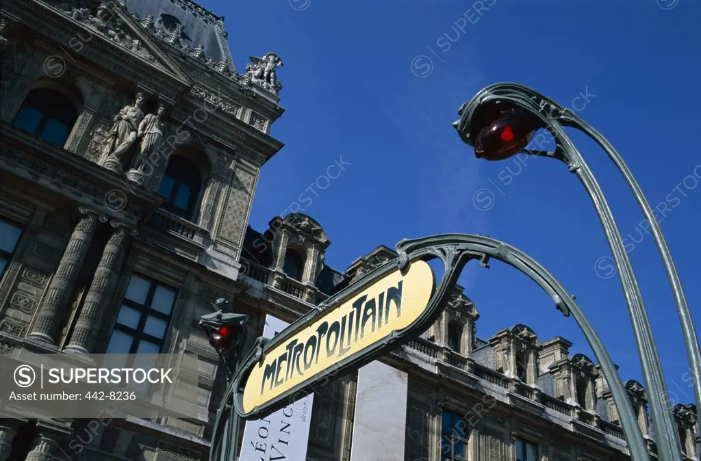 Low angle view of Art Deco Metro signs, Paris, France