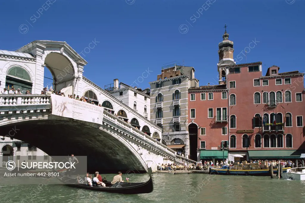 Gondola near a bridge, Rialto Bridge, Grand Canal, Venice, Italy