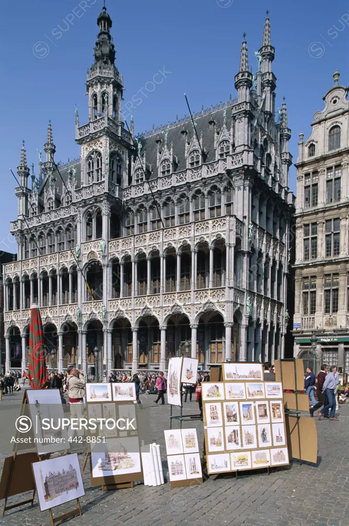 Paintings on display in front of the Town Hall, Grand Place, Brussels, Belgium