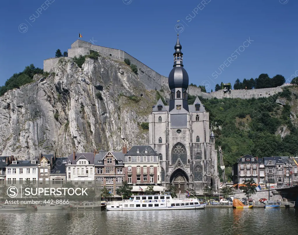 Facade of a cathedral on a river, Collegiate Church of Notre-Dame and Citadel, Meuse River, Dinant, Belgium