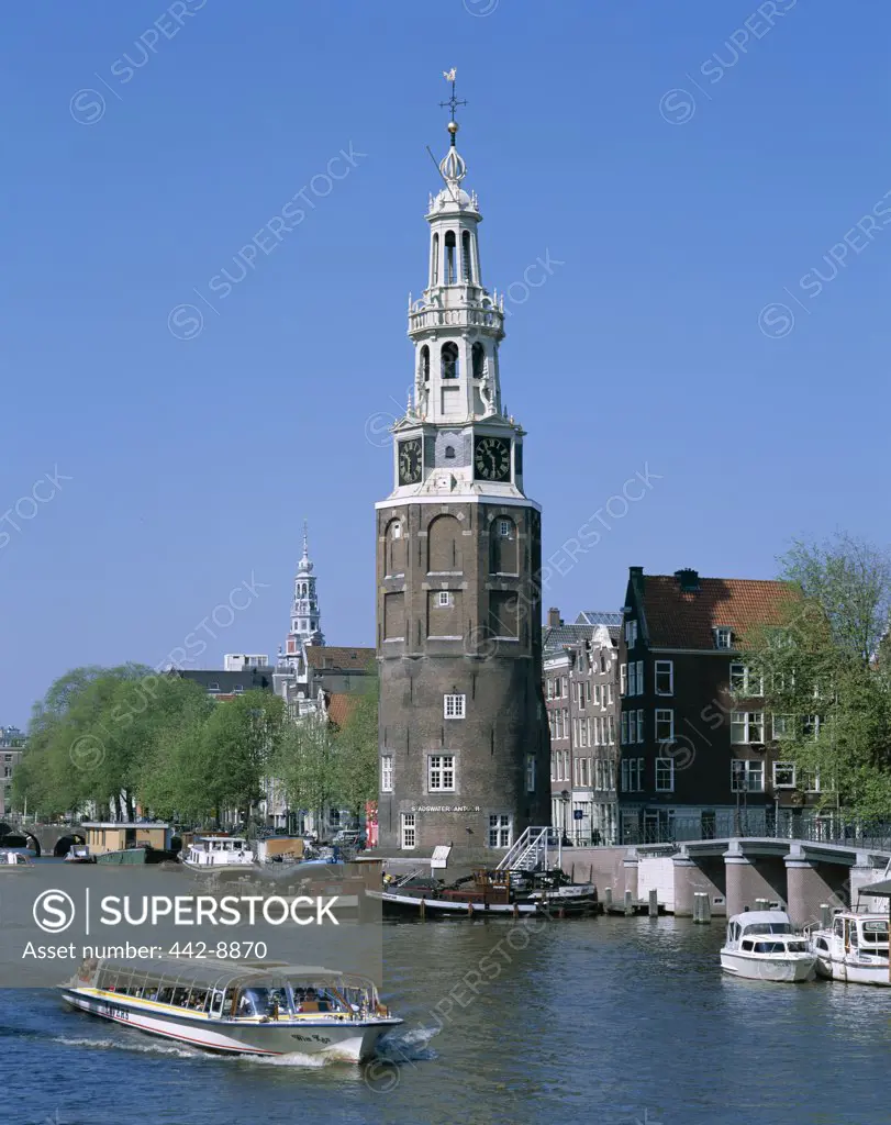 Montelbaanstoren and Canal Tour Boats, Amsterdam, Netherlands