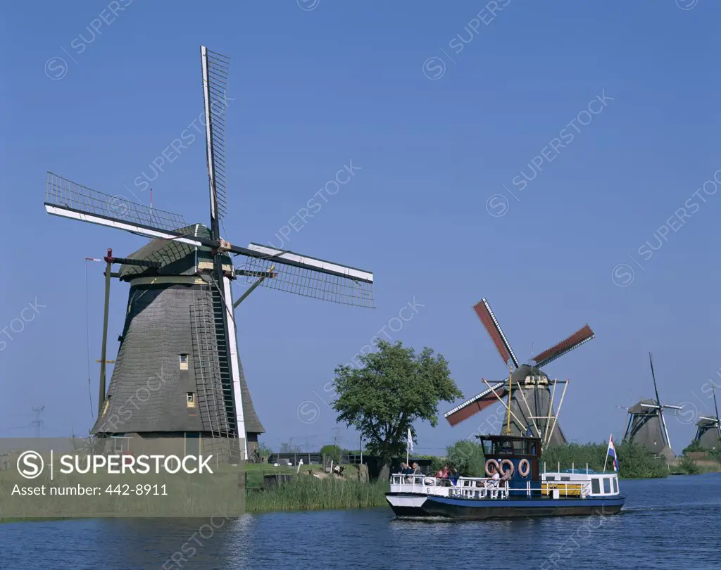Windmills and Canal Tour Boat, Kinderdijk, Netherlands