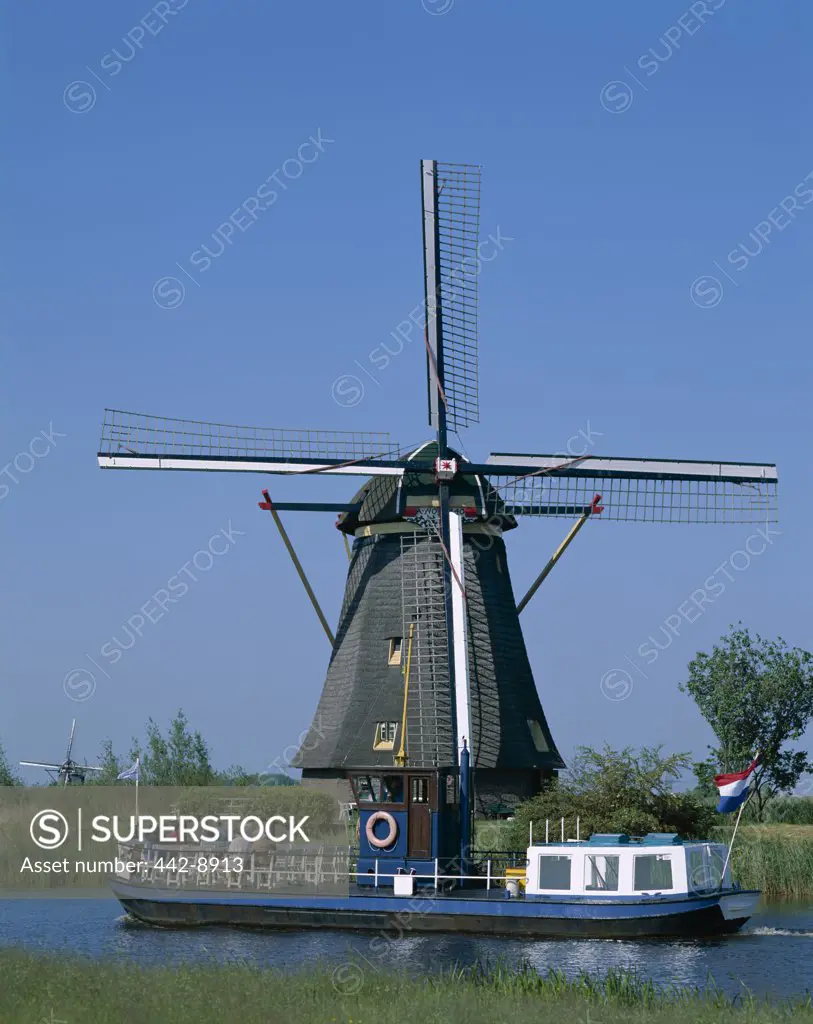 Windmill and Canal Tour Boat, Kinderdijk, Netherlands