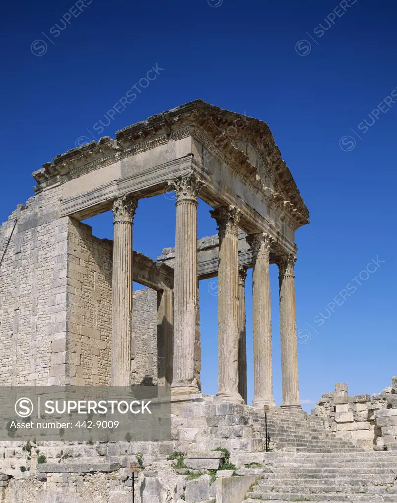 Low angle view of the ruins of an ancient building, Dougga, Tunisia