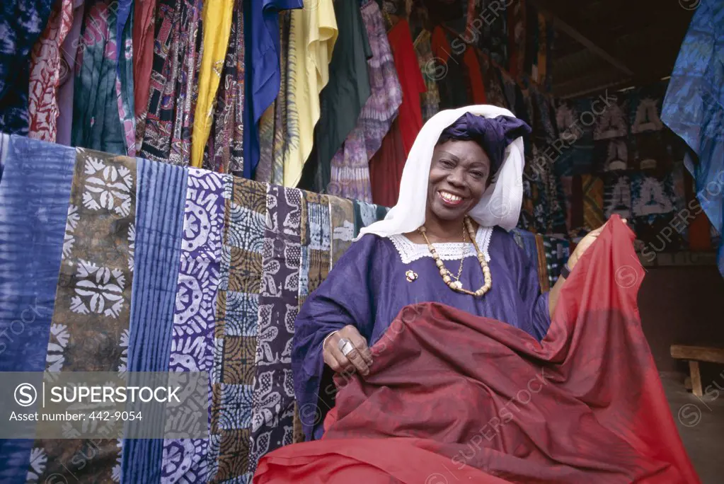 Portrait of a female Batik vendor, Albert Market, Banjul, Gambia