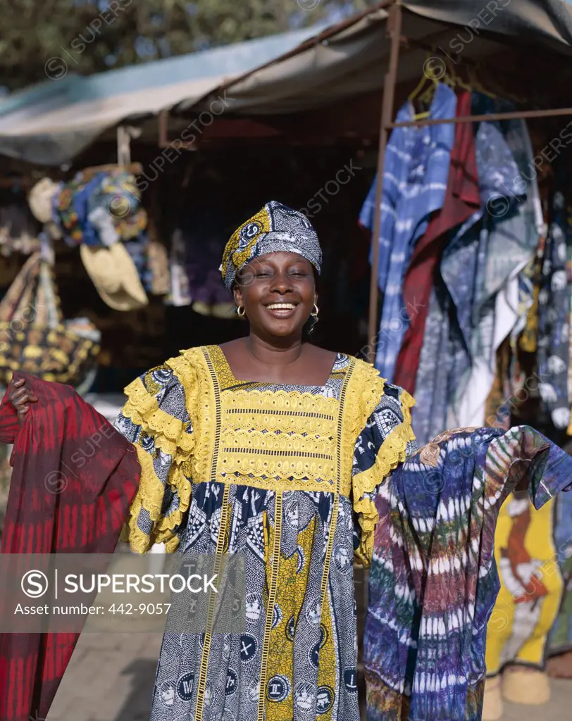 Portrait of a female Batik vendor, Albert Market, Banjul, Gambia
