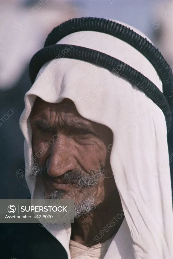 Close-up of a senior man wearing a headdress, Arab, Egypt