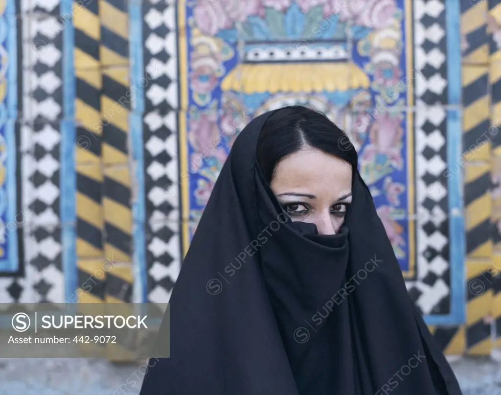 Portrait of a young Muslilm woman wearing a headdress, Iraq