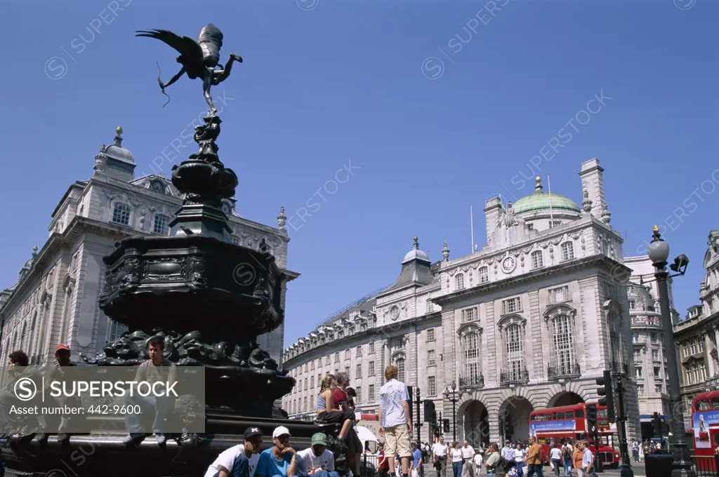 Low angle view of the statue of Eros, Piccadilly Circus, London, England