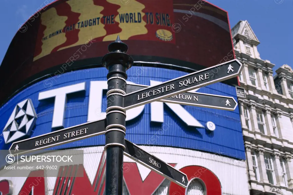 Low angle view of a sign post, Piccadilly Circus, London, England