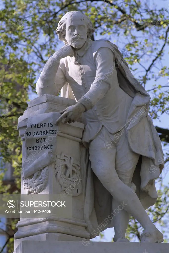 Low angle view of a statue, Shakespeare Statue, Leicester Square, London, England
