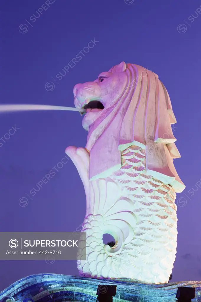 Low angle view of a statue at dusk, Merlion Statue, Singapore