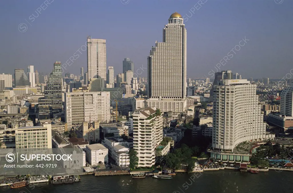 High angle view of skyscrapers on the waterfront, Chao Phraya River, Bangkok, Thailand