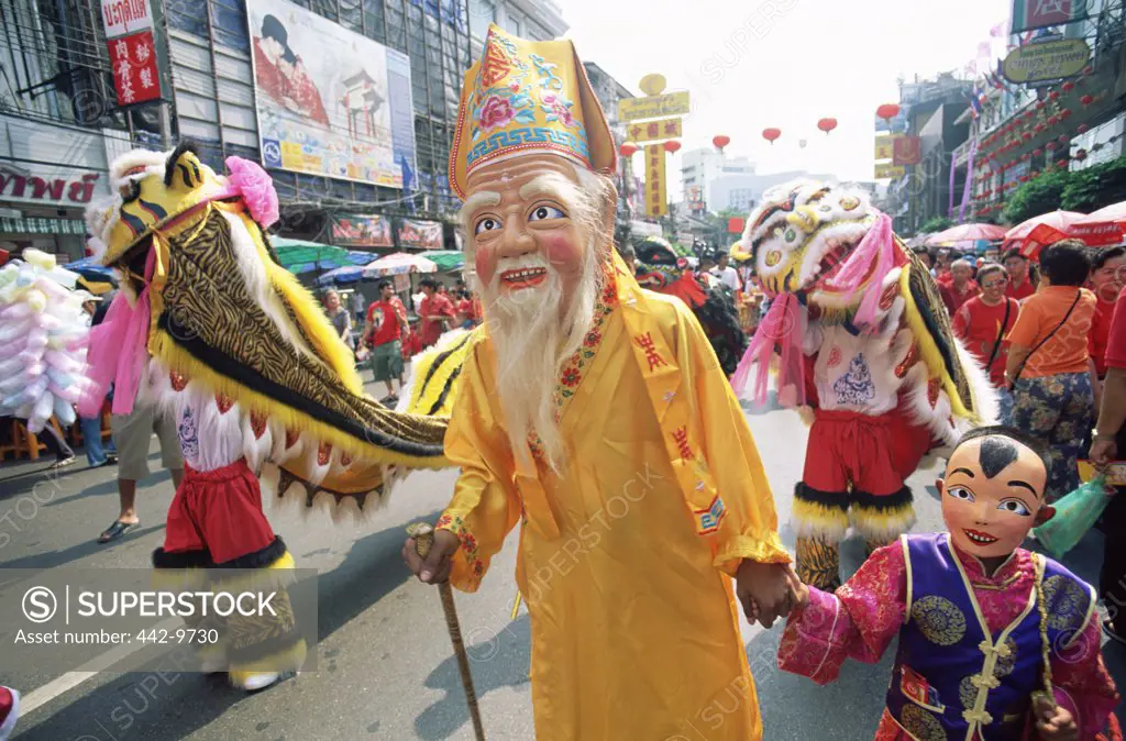 Group of people celebrating Chinese New Year Parade, Chinatown, Bangkok, Thailand