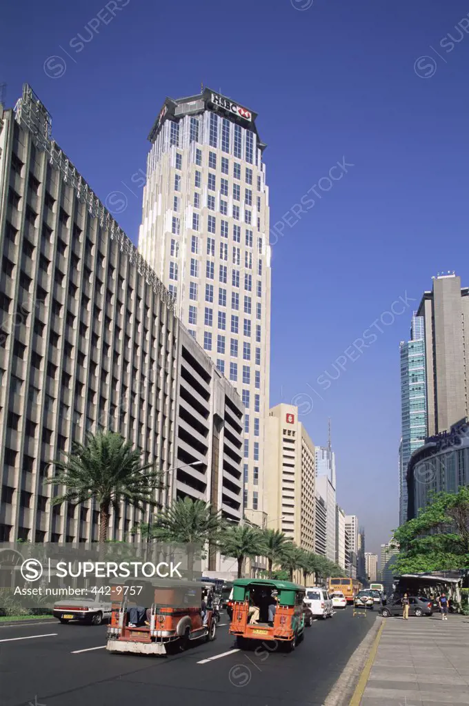 Low angle view of buildings along a road, Makati, Manila, Philippines