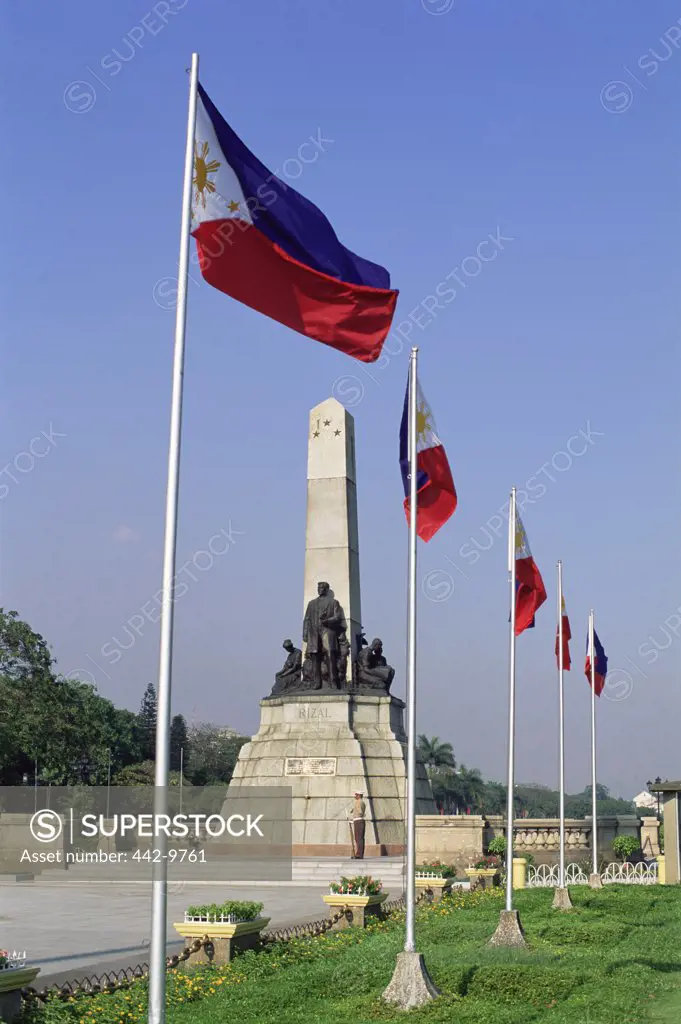 Low angle view of flags in a row, Rizal Memorial, Manila, Philippines