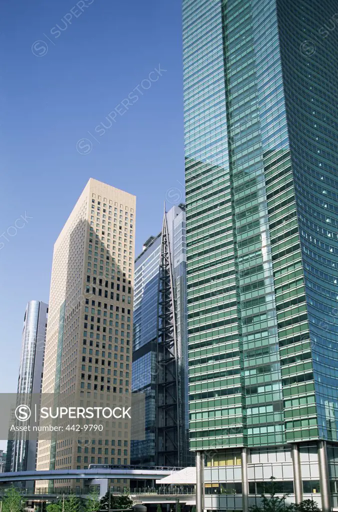 Low angle view of skyscrapers, Shiodome Shiosite, Tokyo, Japan