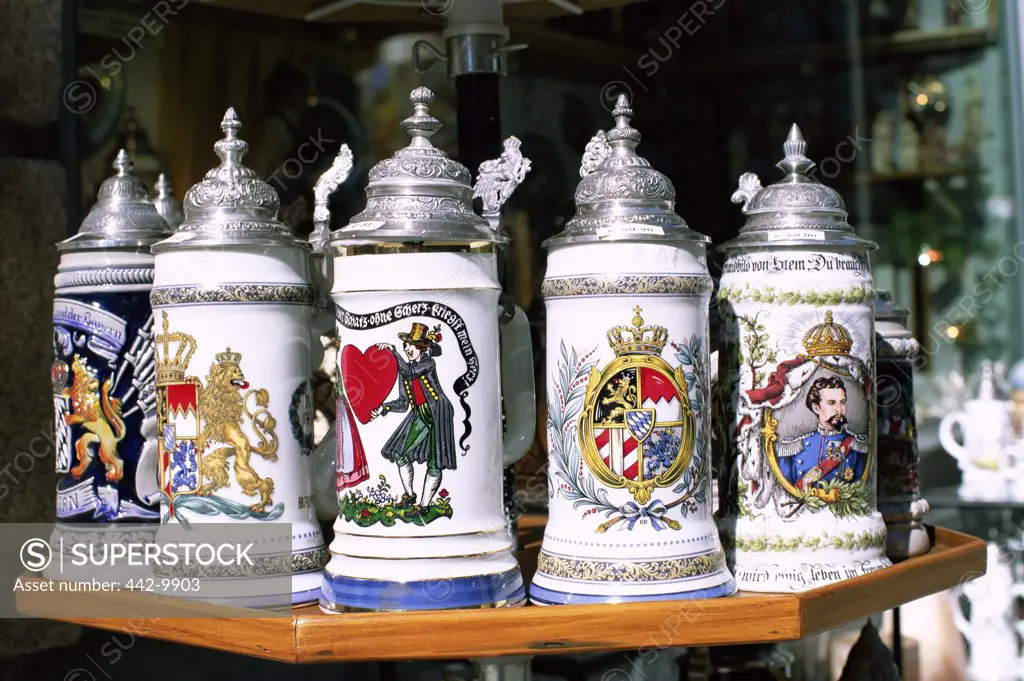 Close-up of a group of beer steins on a table, Munich, Germany