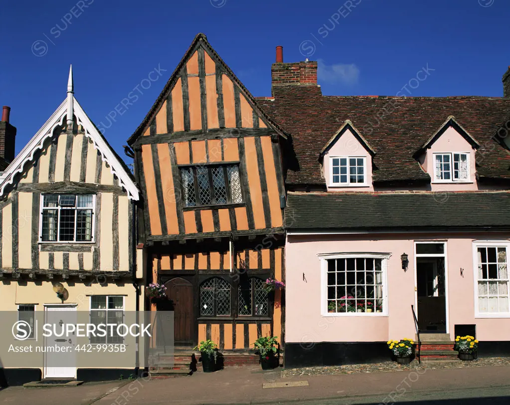 Facade of cottages in a village, Lavenham, Suffolk, England