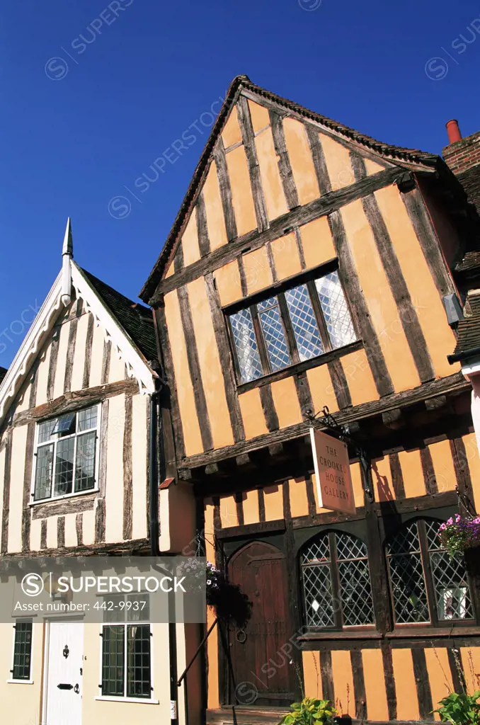 Low angle view of cottages in a village, Lavenham, Suffolk, England