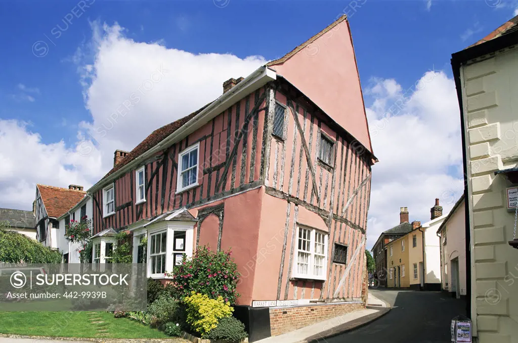 Low angle view of a cottage in a village, Lavenham, Suffolk, England