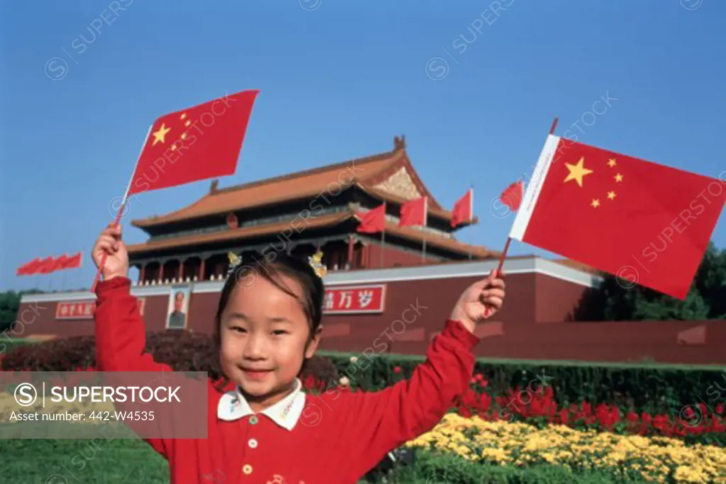 Portrait of a girl in front of a building, Tiananmen Gate, Tiananmen Square, Beijing, China