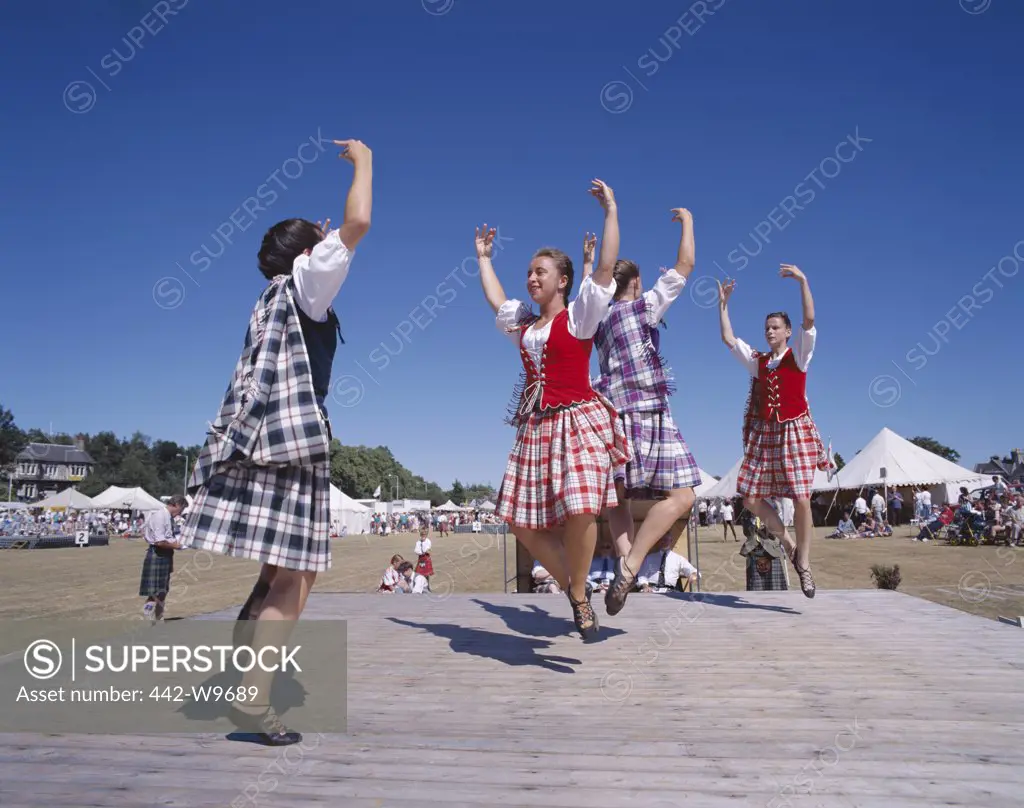 Group of young women Highland dancing, Highland Games, Highlands, Scotland