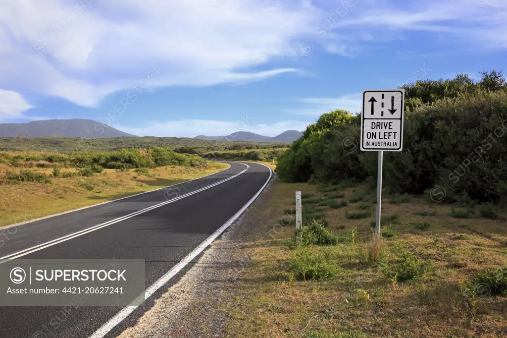 'Drive On Left' sign on roadside verge, Australia, October 