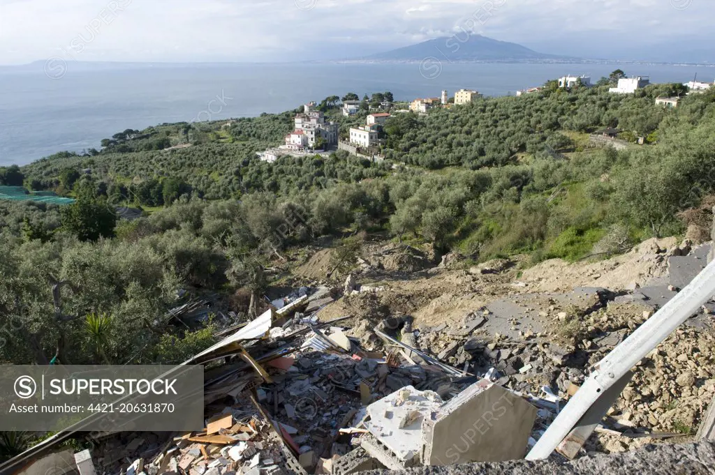 Flood damaged coastal road through olive groves and farmland, which has collapsed after heavy rain on the Bay of Naples near Sorrento, May