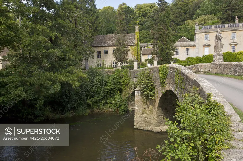 View of river and old bridge near manor house, Iford Manor, River Frome, Frome Valley, Wiltshire, England, August