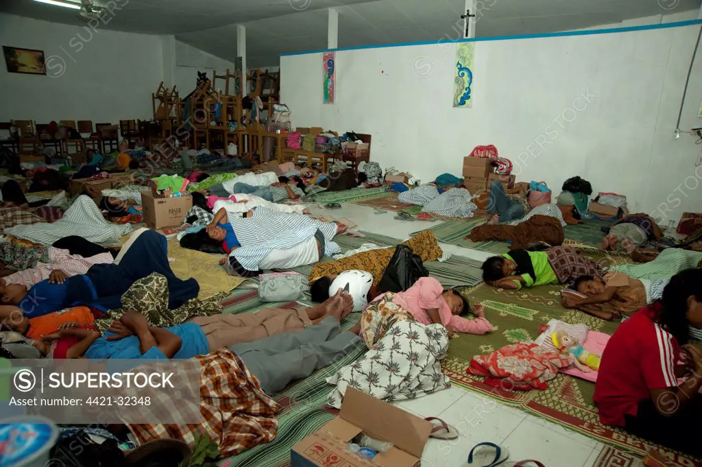 Refugees from recent volcanic eruption, sleeping in dormitory, near Jogyakarta, Mount Merapi, Central Java, Indonesia, november 2010