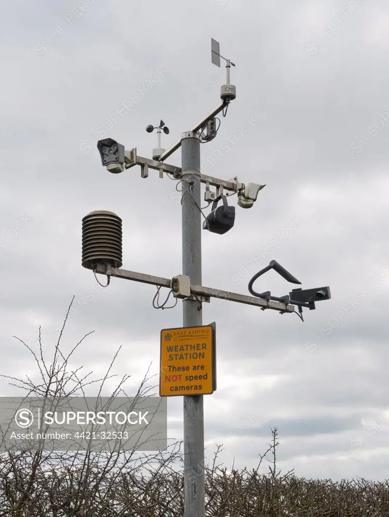 Weather station with 'These are not speed cameras' sign, Garrowby Hill, Garrowby, East Yorkshire, England, march