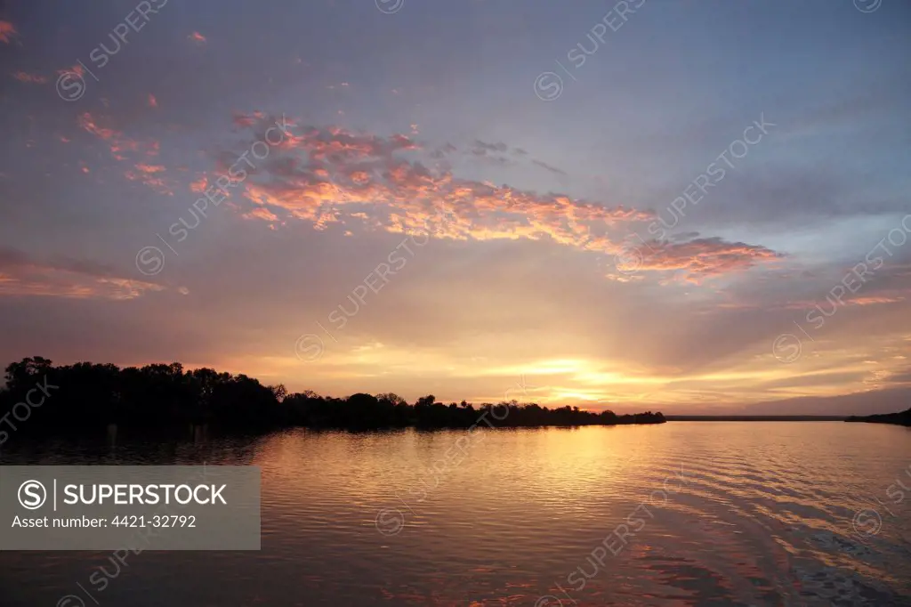 Sunset over river habitat, Gambia River, Gambia, january