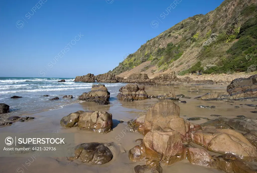 Rocky beach below cliffs, Port St. Johns, 'Wild Coast', Eastern Cape (Transkei), South Africa