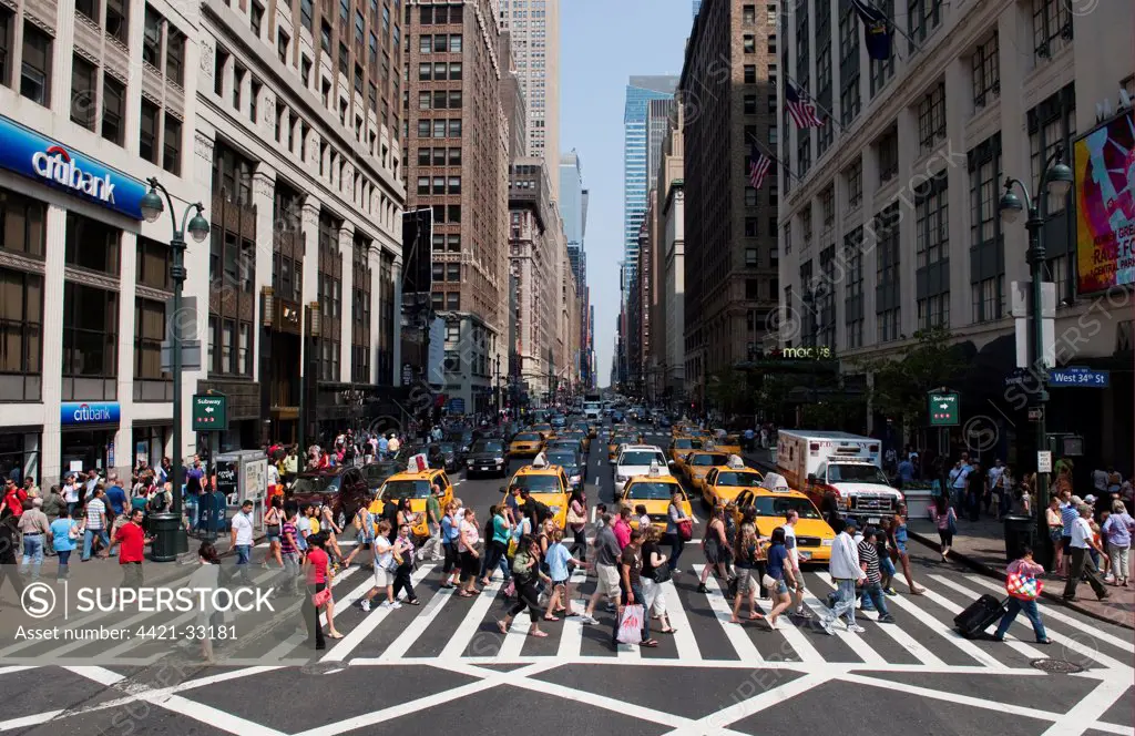 Pedestrians crossing road in city, Manhattan Island, New York City, New York State, U.S.A., september