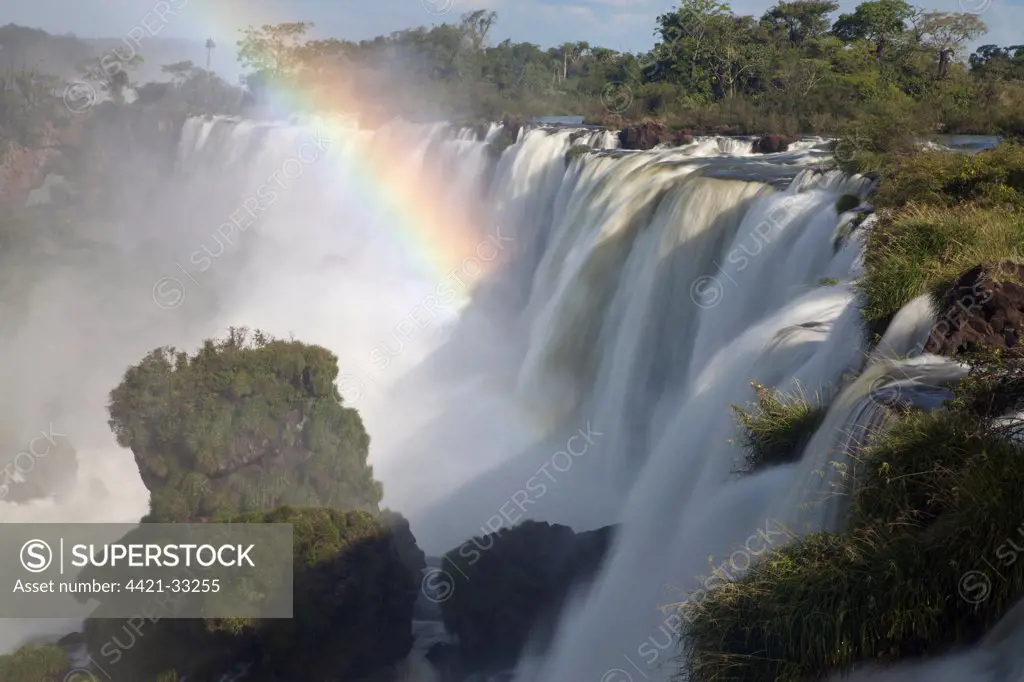 View of waterfall with rainbow, Iguazu Falls, Iguazu N.P., Argentina