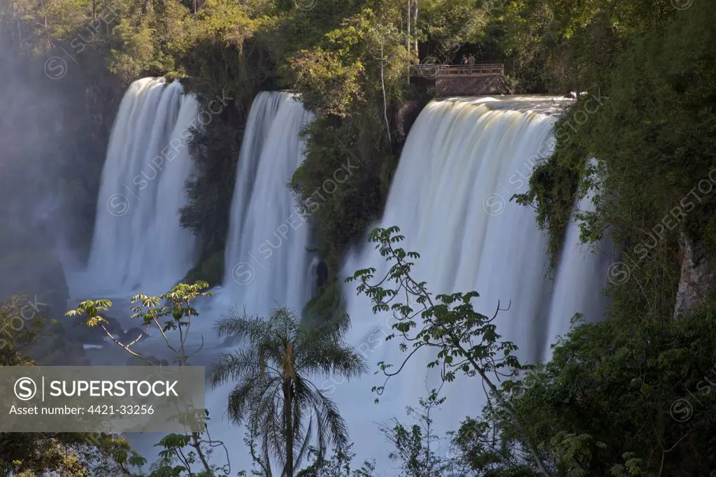 View of waterfall with viewing platform, Iguazu Falls, Iguazu N.P., Argentina