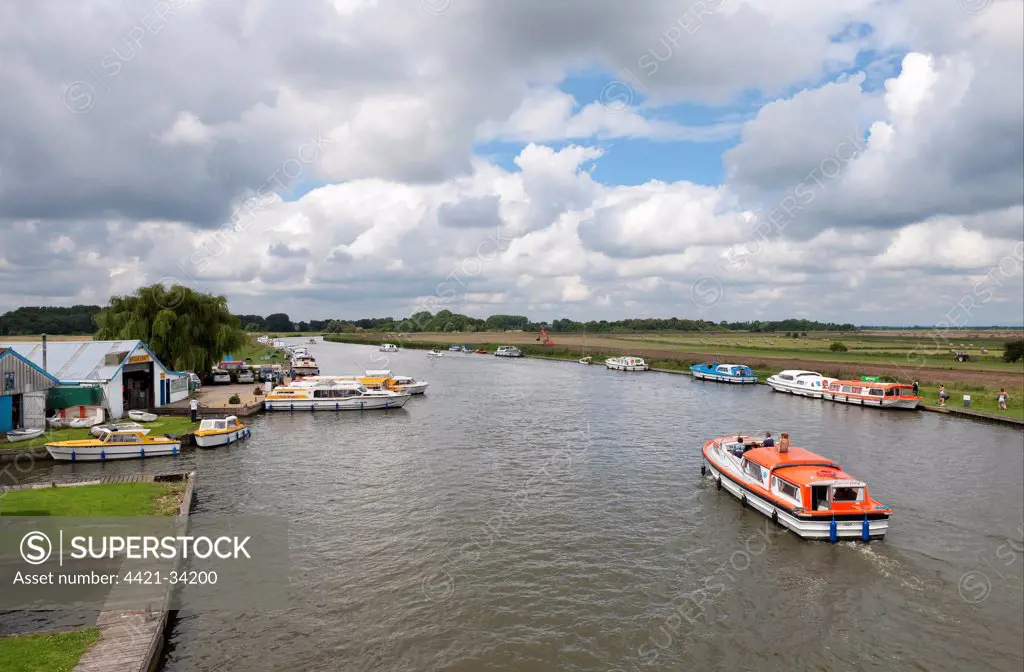 View of boatyard and hire boats, Acle Bridge, Acle, River Bure, The Broads N.P., Norfolk, England, august