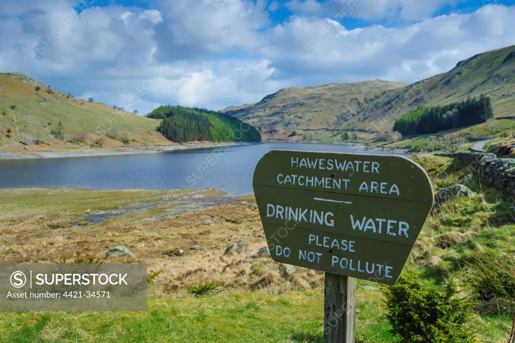 'Haweswater Catchment Area, Drinking Water, Please Do Not Pollute' sign near upland reservoir, Haweswater Reservoir, Mardale Valley, Lake District, Cumbria, England, april