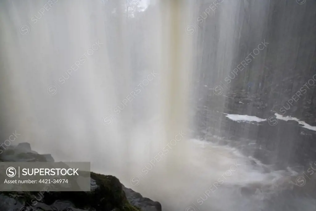 View of waterfall from behind falls, Sgwd yr Eira Waterfall, River Hepste, Brecon Beacons N.P., Powys, Wales, october