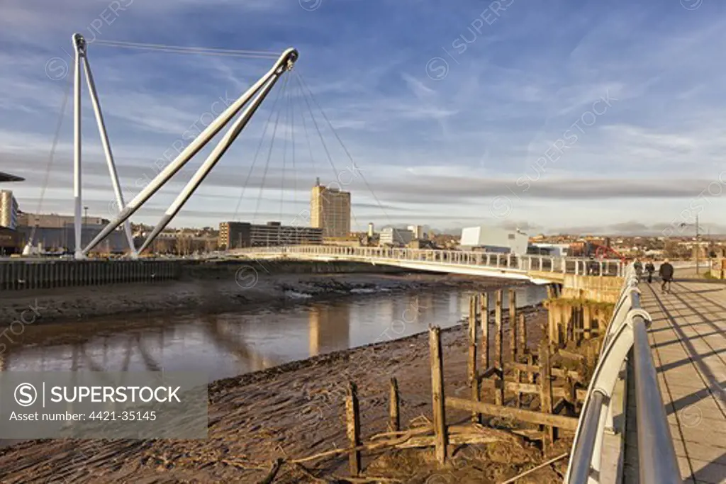 View of tidal river and footbridge, Newport City Footbridge, River Usk, Newport, South Wales, Wales, january