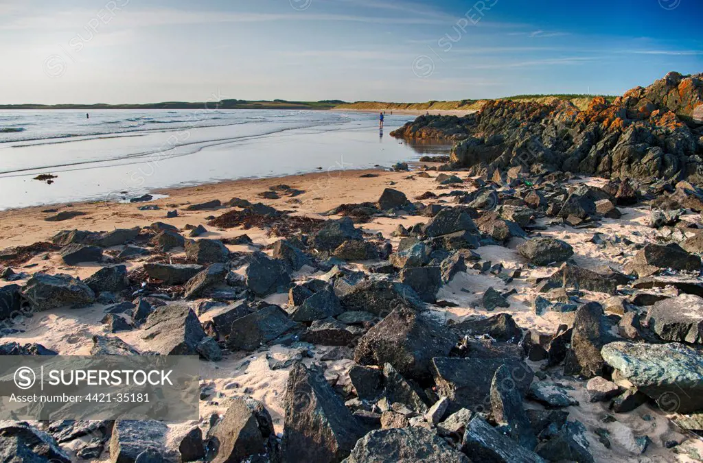 View of rocky beach, Newborough, Anglesey, Wales, August