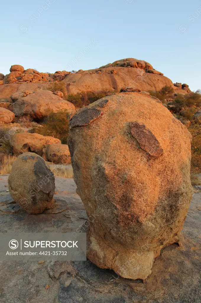 Weathered granite boulders, scattered in desert, Erongo, Namibia
